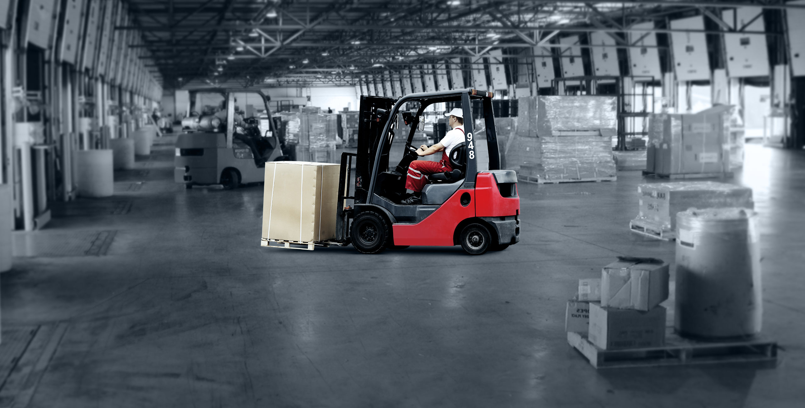 Forklift moving freight in cross dock facility
